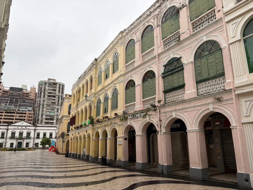 Pastel-coloured colonial arcaded buildings in Macau's old town