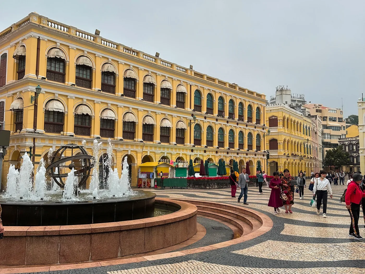 Senado Square in Macau, with its armillary-sphere fountain and wave-patterned Portuguese paving